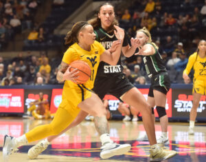 WVU holds off upset bid by Wright State; J.J. Quinerly scores a career-high 30